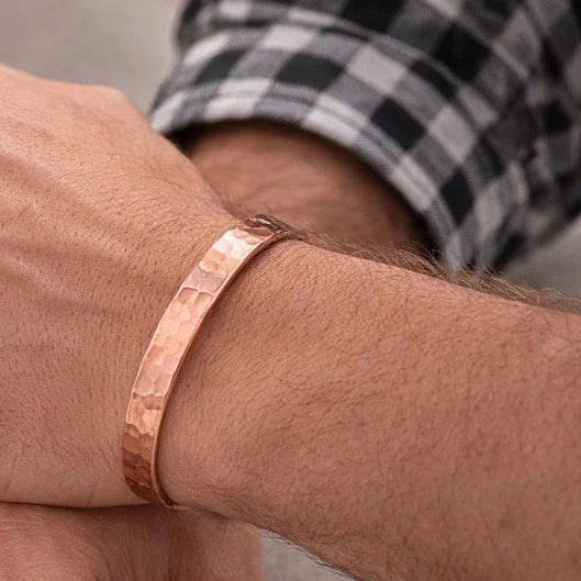 Copper cuff bracelet worn on wrist – lifestyle photo